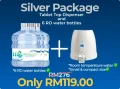 A silver package with a smiley face on the front. The package contains 6 RO water bottles and a smiley dispenser. The RO water bottles are clear and have a blue cap. The smiley dispenser is white and has a smiley face on the front.